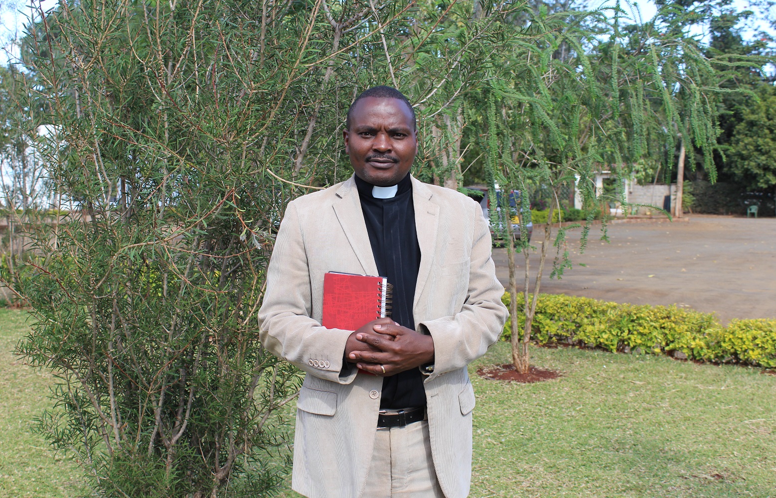 Rev. Simon Kamande